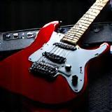Guitarra elétrica sobre amplificador